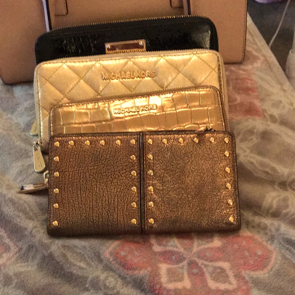 Michael Kors gently used billfold/wallets 4 total